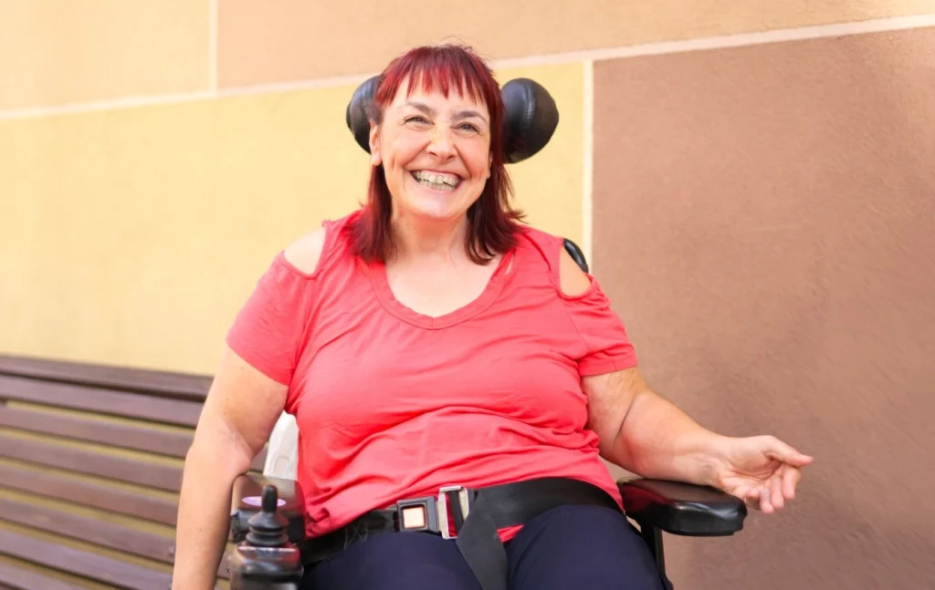 Disabled woman smiling at camera